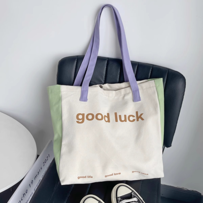 Niche design canvas bag men's and women's color matching macaron summer lightweight breathable large capacity shoulder bag
