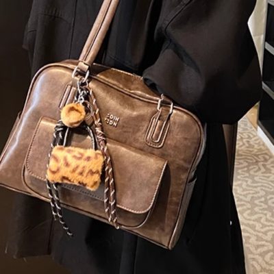 New niche design Boston Vintage soft leather biker bag One shoulder underarm bag hand baguette bag
