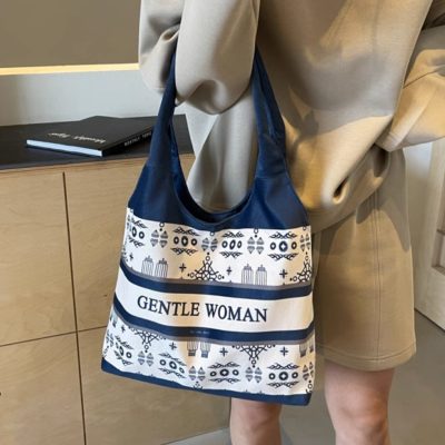 South Korea's small underarm commuter bag women's large capacity Tote bag all-in-one alphabet canvas shoulder bag
